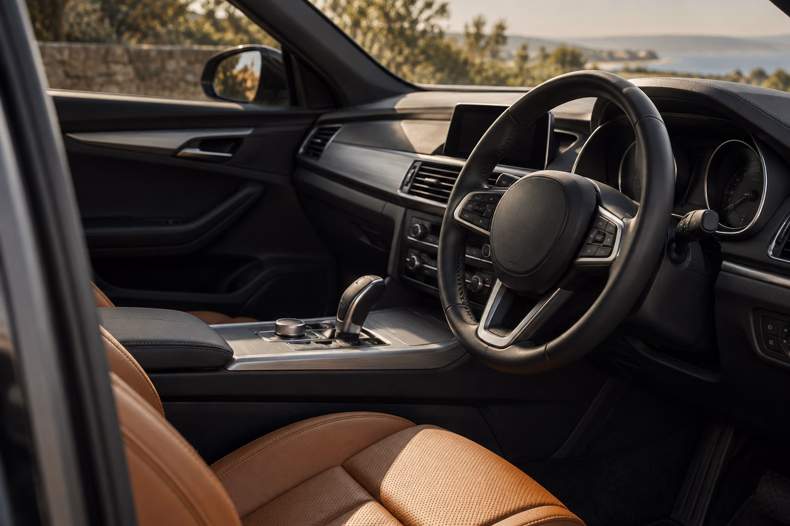 Leather steering wheel and the quiet details of a car interior